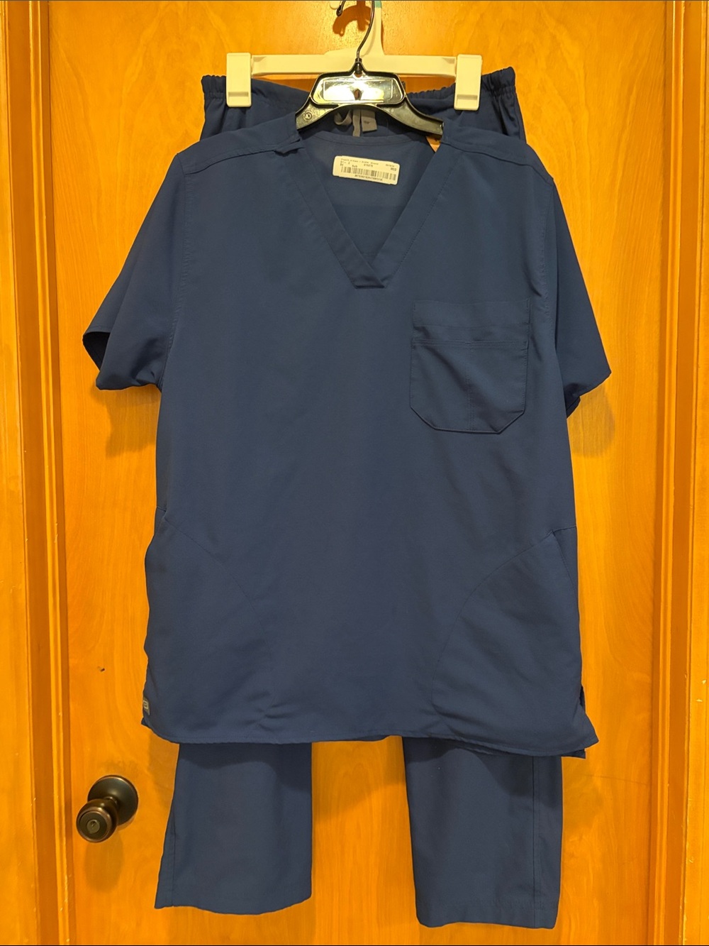Classic Women's Navy Scrub Set with V-Neck Top and Drawstring Pants